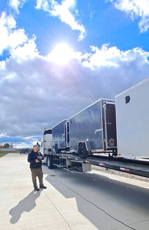 Our first shipment of Homesteader Trailers enclosed cargo trailers still on the truck at JTI Trailer…